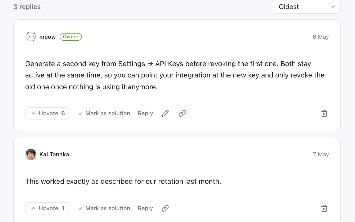 A reply from the support team, labeled with the author name and their role.